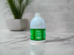 Large bottle of cleaning solution on a desk in an office setting